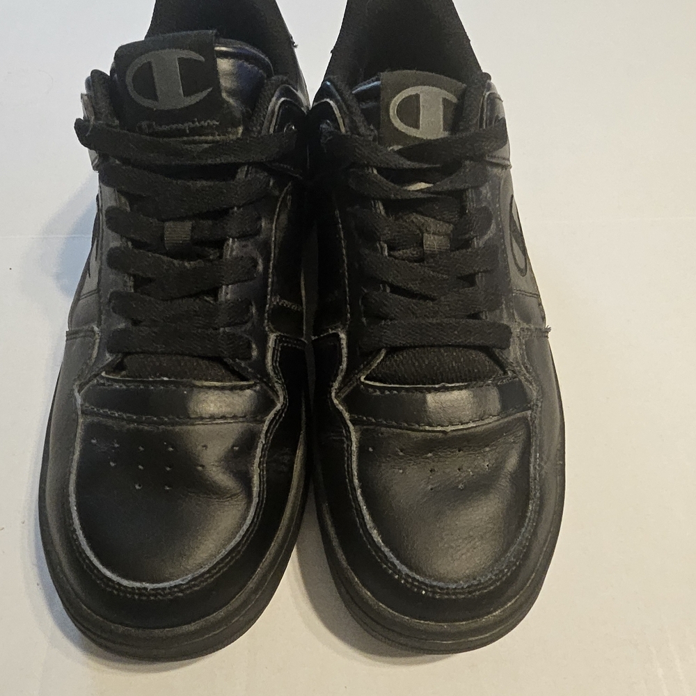 Champion Black Sneakers with Sturdy Construction and Versatile Design